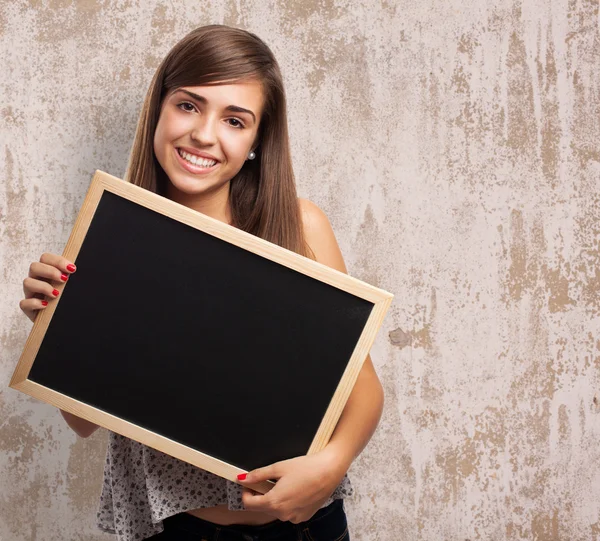 Pretty student holding chalkboard — Stock Photo, Image