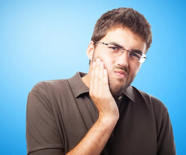Young man suffering strong toothache — Stock Photo, Image