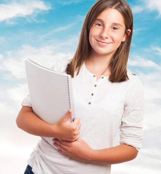 Cute girl holding notebook — Stock Photo, Image
