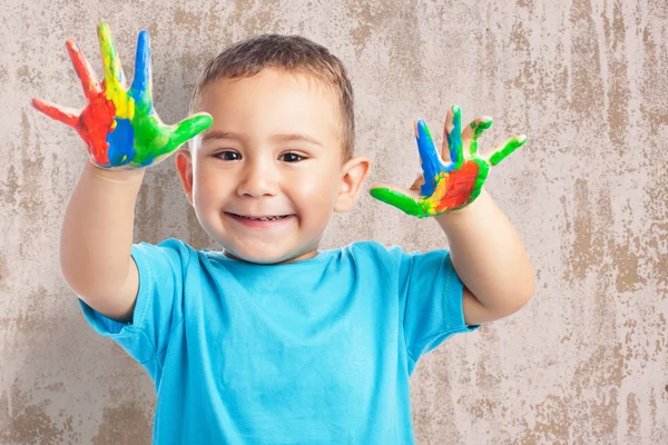 Lindo niño con las manos pintura —  Fotos de Stock