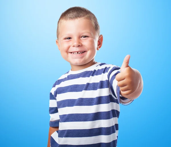 Cute kid doing positive sign — Stock Photo, Image