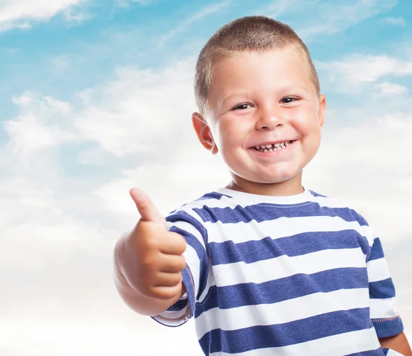 Cute kid doing positive sign — Stock Photo, Image