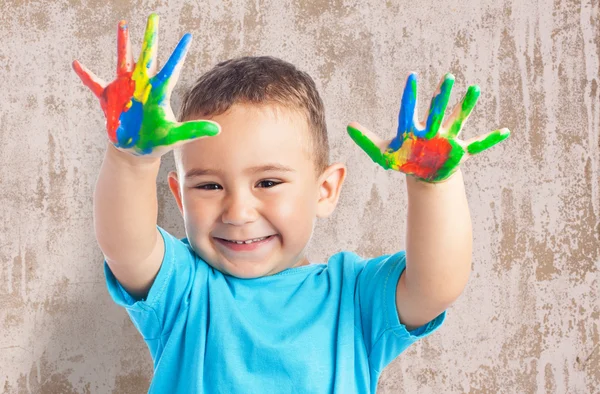 Lindo niño jugando con pintura —  Fotos de Stock