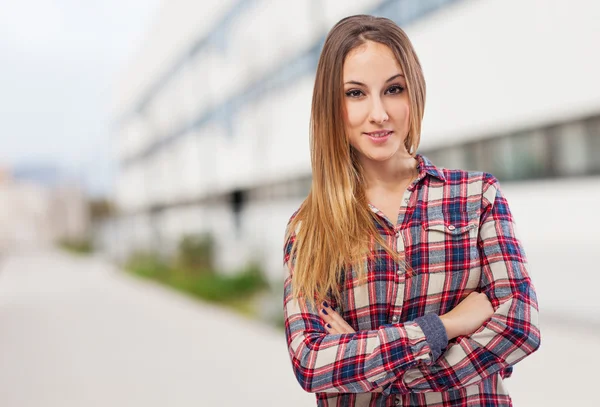 Young woman with arms crossed — Stock Photo, Image