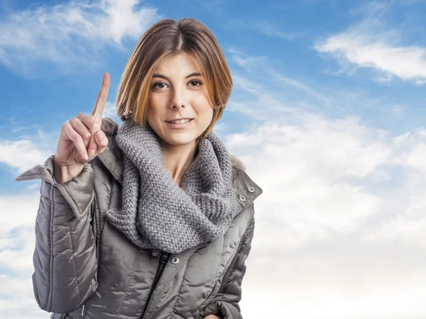 Mujer haciendo el gesto número uno — Foto de Stock