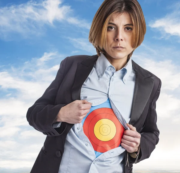 Young business woman with target — Stock Photo, Image