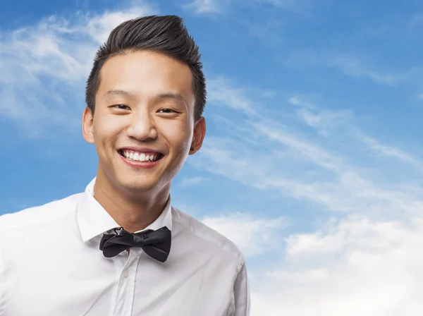 Elegant young asian man smiling — Stock Photo, Image