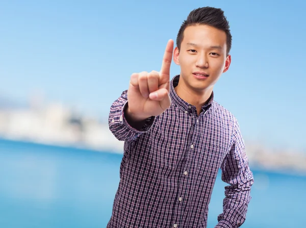 Asian man doing one gesture — Stock Photo, Image