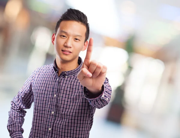 Asian man doing one gesture — Stock Photo, Image