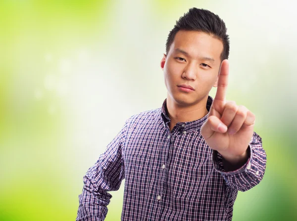 Asiático homem fazendo um gesto — Fotografia de Stock