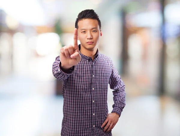 Asian man doing one gesture — Stock Photo, Image