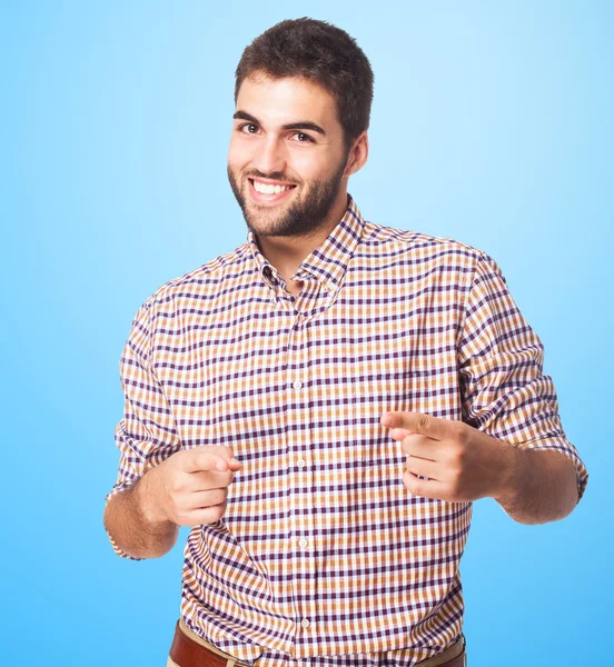 Handsome young man pointing — Stock Photo, Image