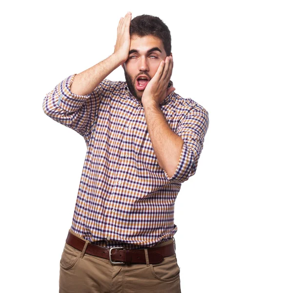 Young man doing crazy gesture — Stock Photo, Image