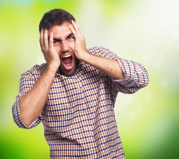 Stressed man pulling his head — Stock Photo, Image