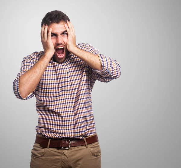 Stressed man pulling his head — Stock Photo, Image