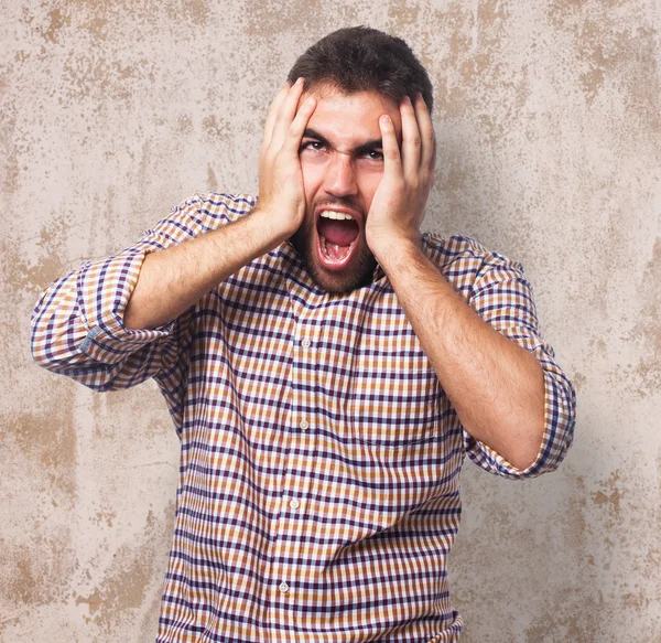 Stressed man pulling his head — Stock Photo, Image