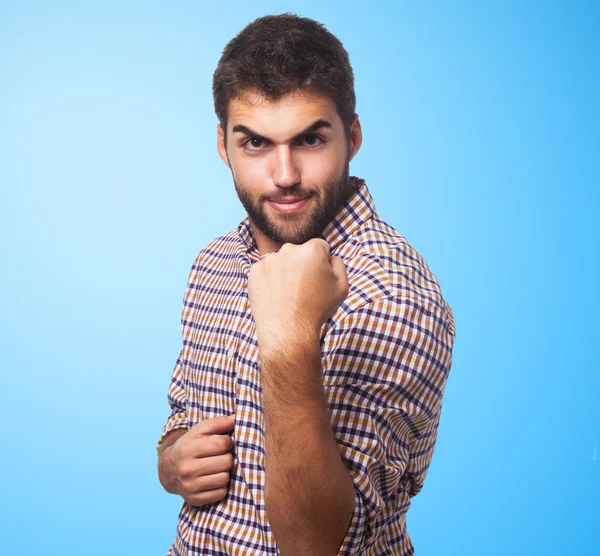 Handsome man doing win gesture — Stock Photo, Image