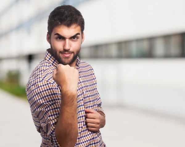 Handsome man doing win gesture — Stock Photo, Image