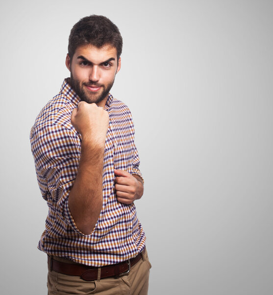 Handsome man doing win gesture