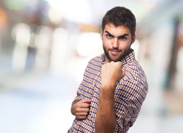 Handsome man doing win gesture — Stock Photo, Image