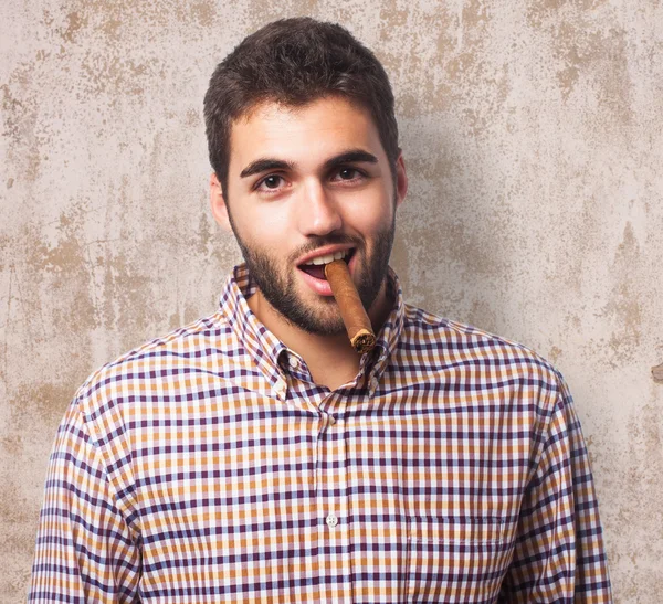 Handsome man smoking cigar — Stock Photo, Image