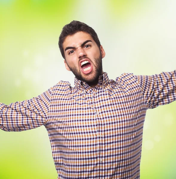 Handsome man doing victory gesture — Stock Photo, Image