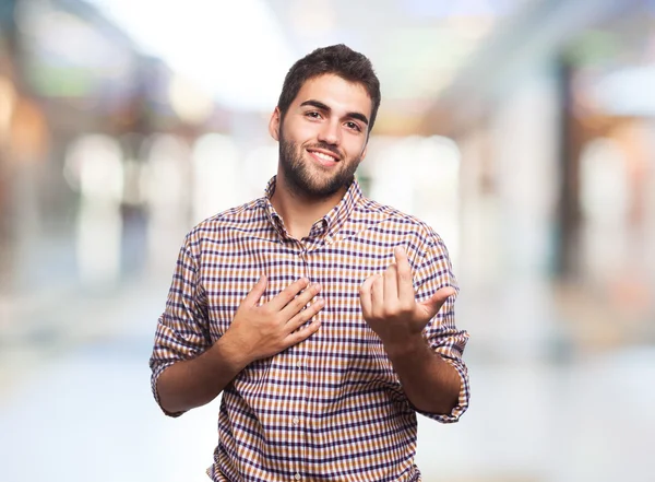 Knappe man doet liefde gebaar — Stockfoto