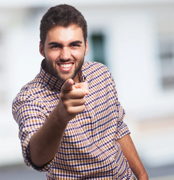 Jonge man wijzend met zijn vinger — Stockfoto