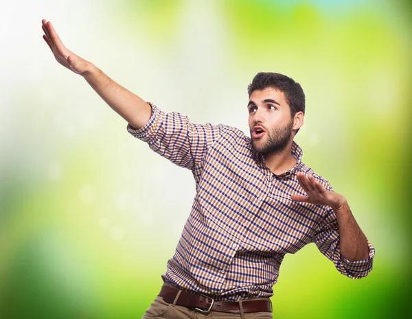 Positive man doing victory gesture — Stock Photo, Image