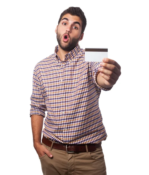 Young man holding credit card — Stock Photo, Image