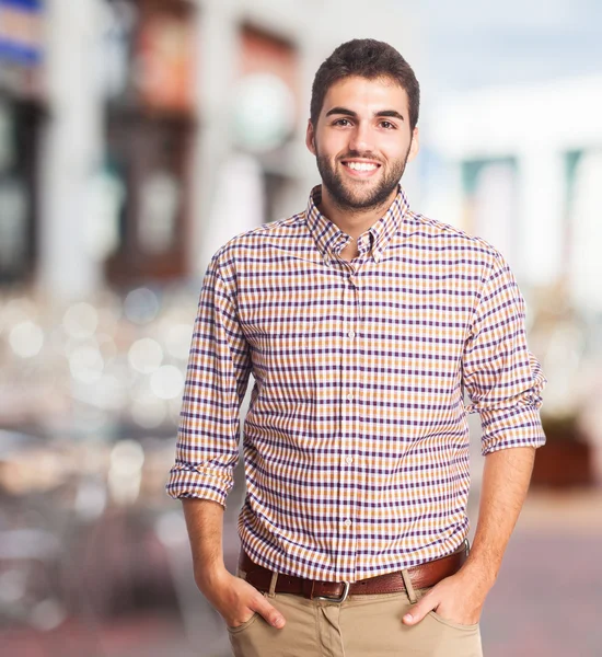 Handsome young man smiling — Stock Photo, Image