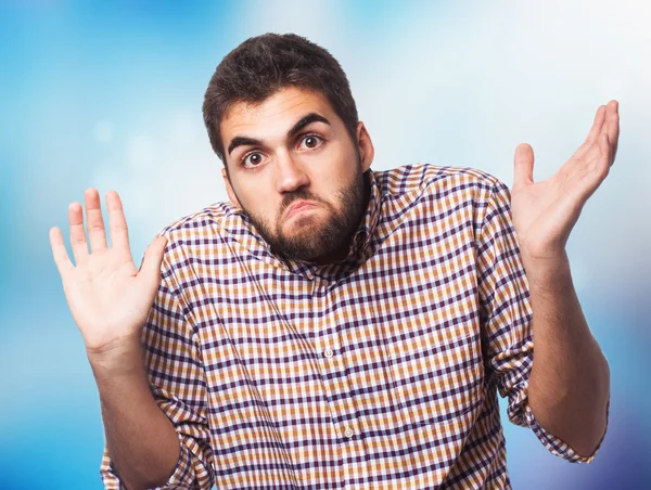 Young man doubting about something — Stock Photo, Image