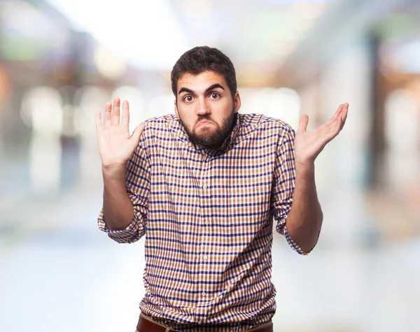 Young man doubting about something — Stock Photo, Image