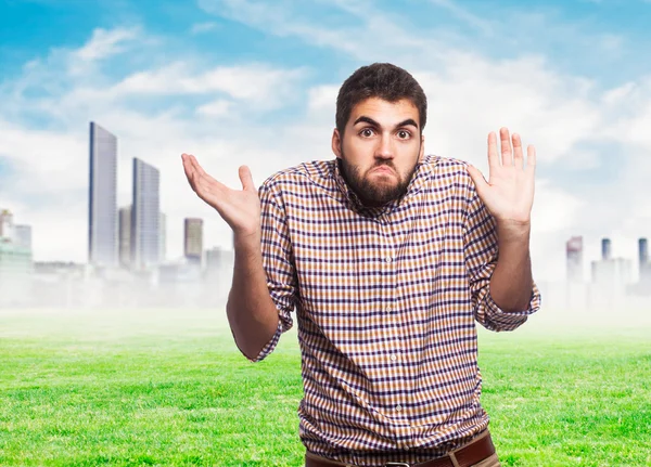 Young man doubting about something — Stock Photo, Image