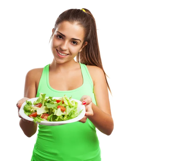 Pretty young woman holding salad Stock Picture