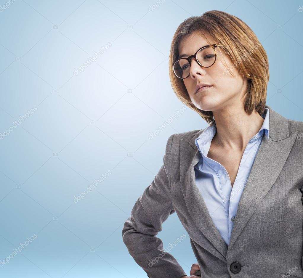 Executive young woman with serious gesture