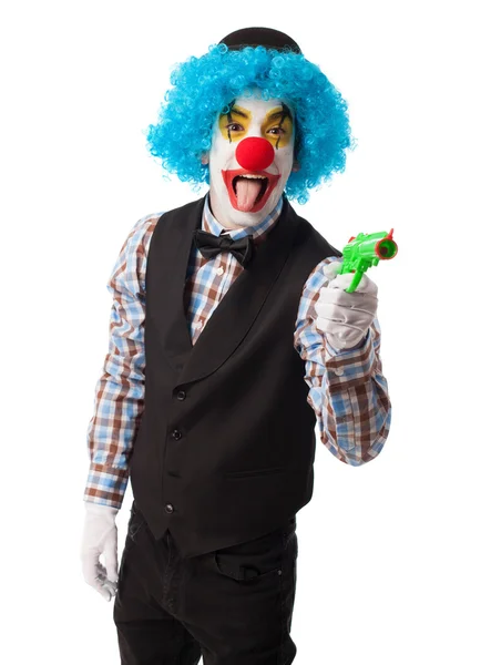 Clown with a gun toy — Stock Photo, Image