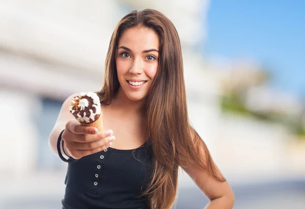 Girl offering a delicious ice cream — Stock Photo, Image