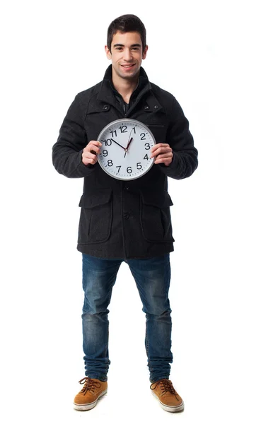 Man holding a clock — Stock Photo, Image