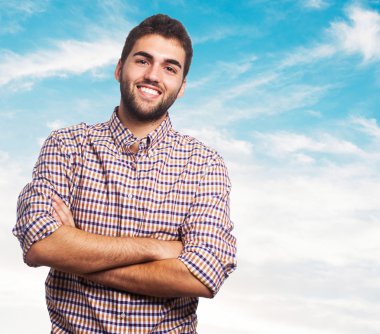 çapraz kolları olan adam