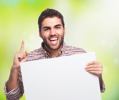 bir afişini tutan adam