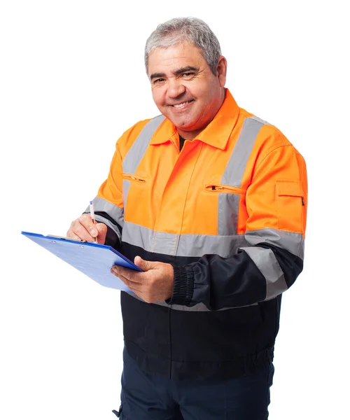 Worker writing on a paper — Stock Photo, Image