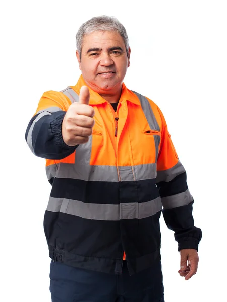 Portrait of a outdoor worker doing an okay symbol — Stock Photo, Image