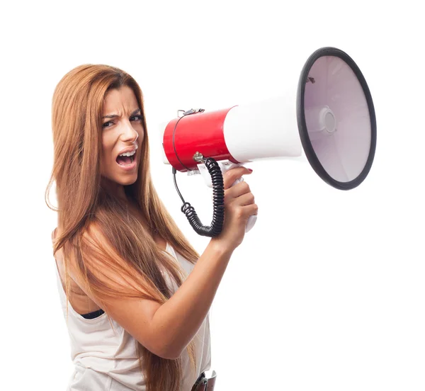 Woman shouting with a megaphone — Stock Photo, Image