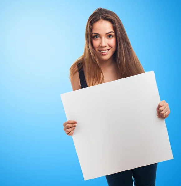 Girl holding a white banner — Stock Photo, Image