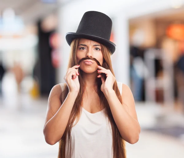 Bella ragazza che imita un uomo — Foto Stock