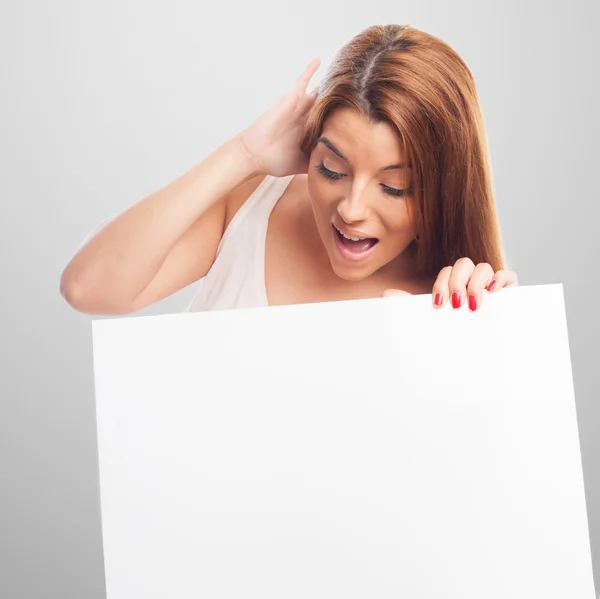 Woman holding a white banner — Stock Photo, Image