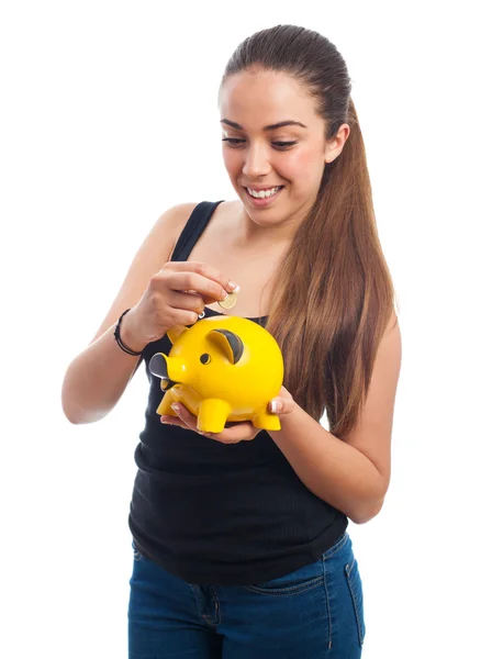 Mulher com banco porquinho — Fotografia de Stock