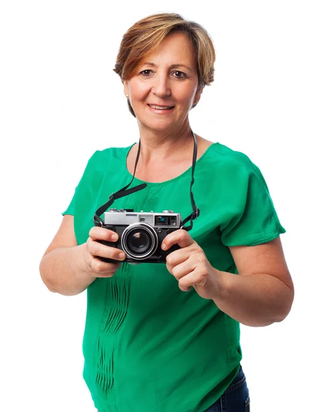Woman ready to take a photo — Stock Photo, Image