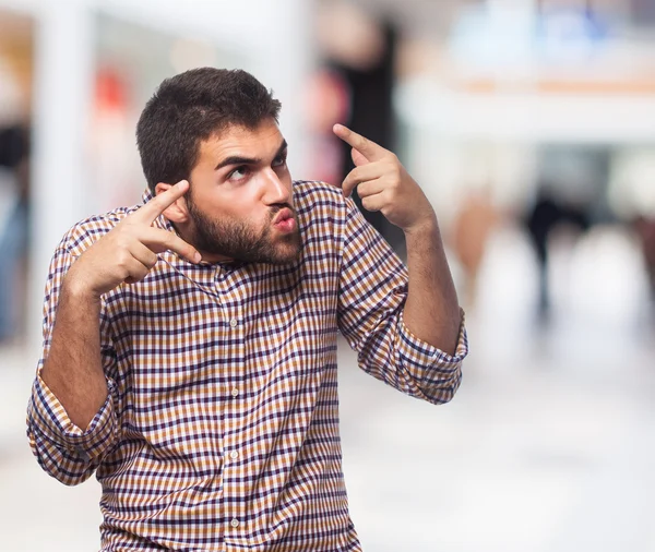 Hombre haciendo un gesto loco — Foto de Stock